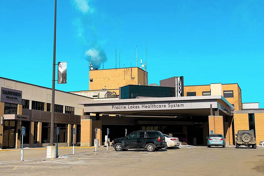 Medicare Supplement Insurance - Prairie Lakes Healthcare System Facility on a Cold Winters Day with a Clear Sky and Smoke Coming Out of the Building in South Dakota