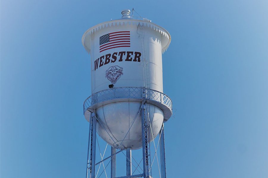Group Health Insurance - Webster Water Tower with American Flag on a Beatiful Day with a Clear Sky